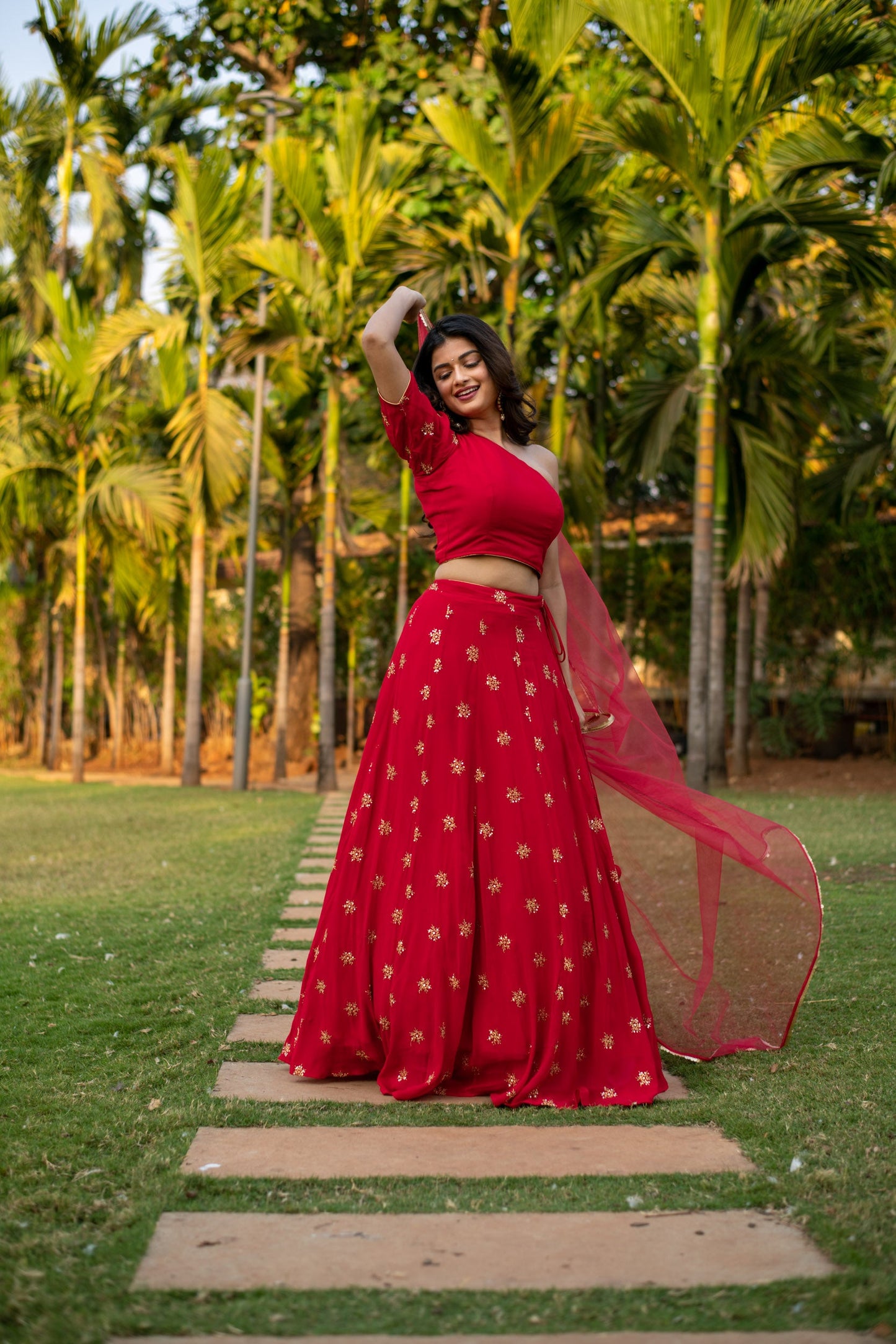 Red one shoulder Lehenga