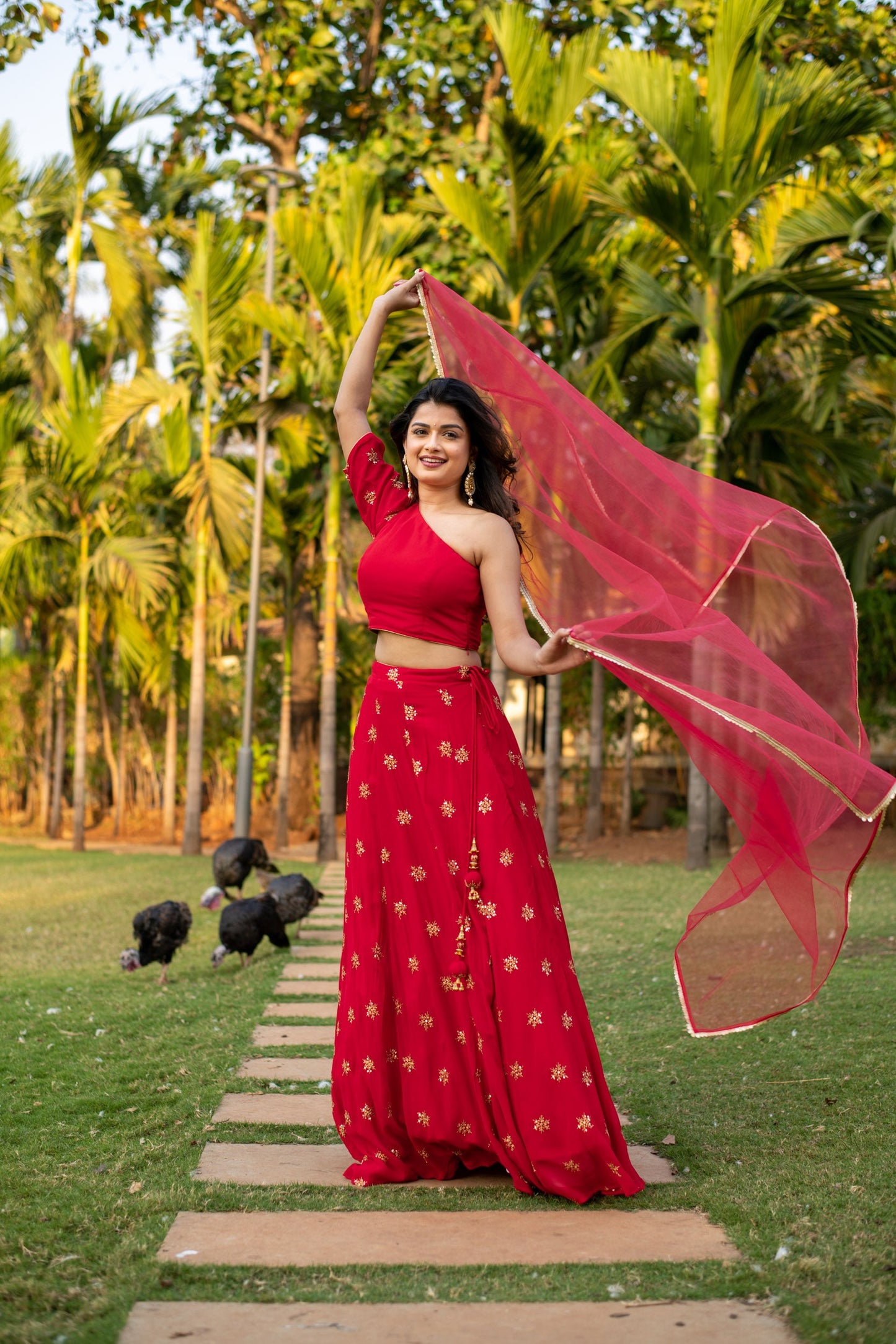 Red one shoulder Lehenga