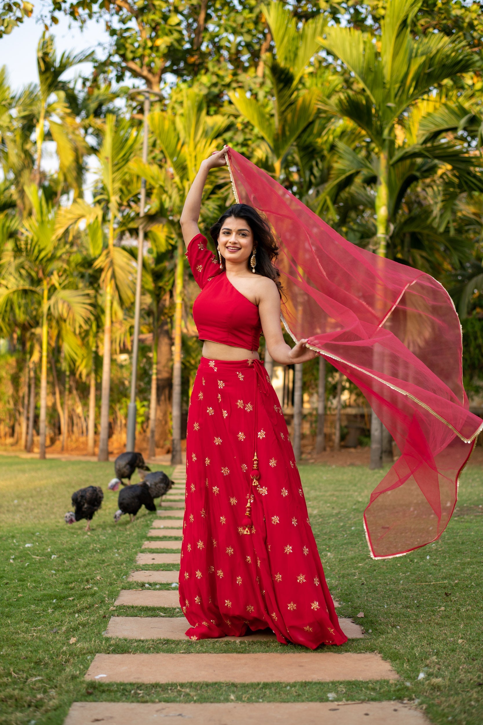 Red one shoulder Lehenga