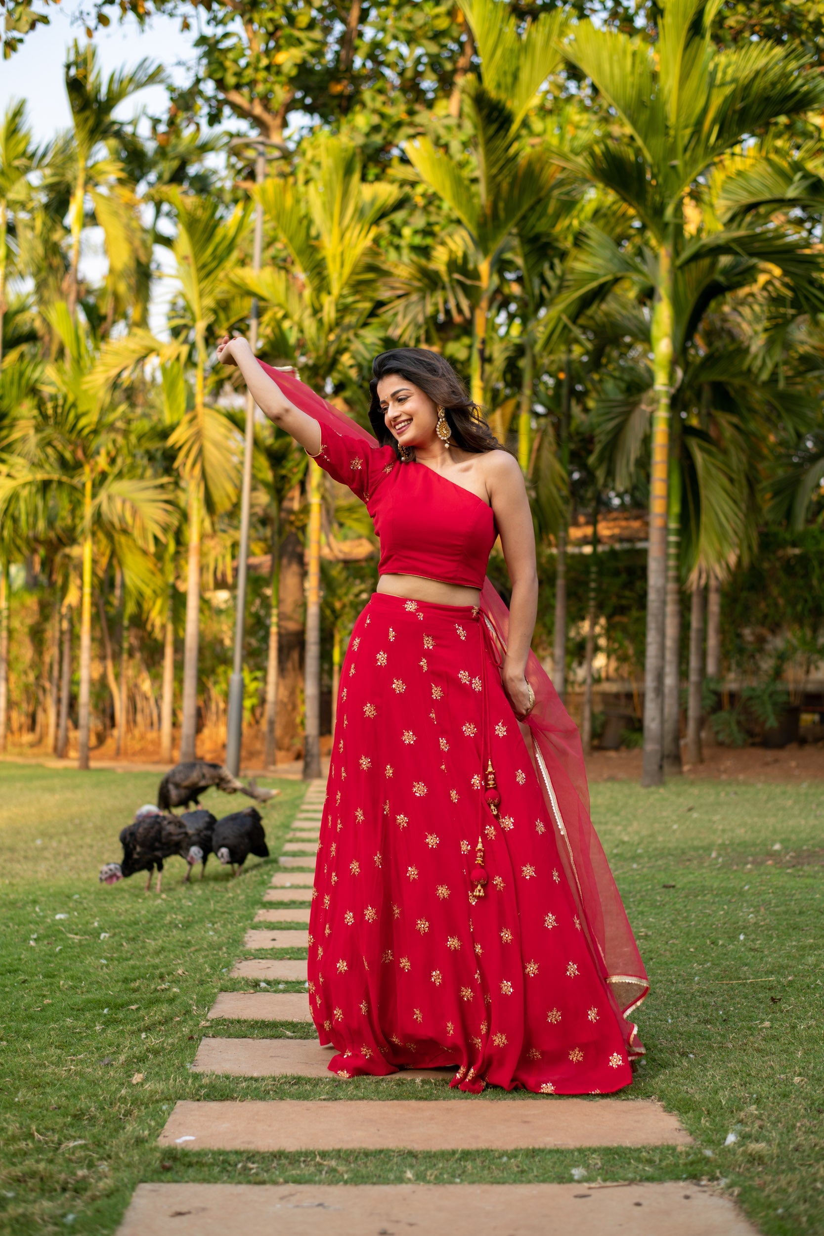 Red one shoulder Lehenga