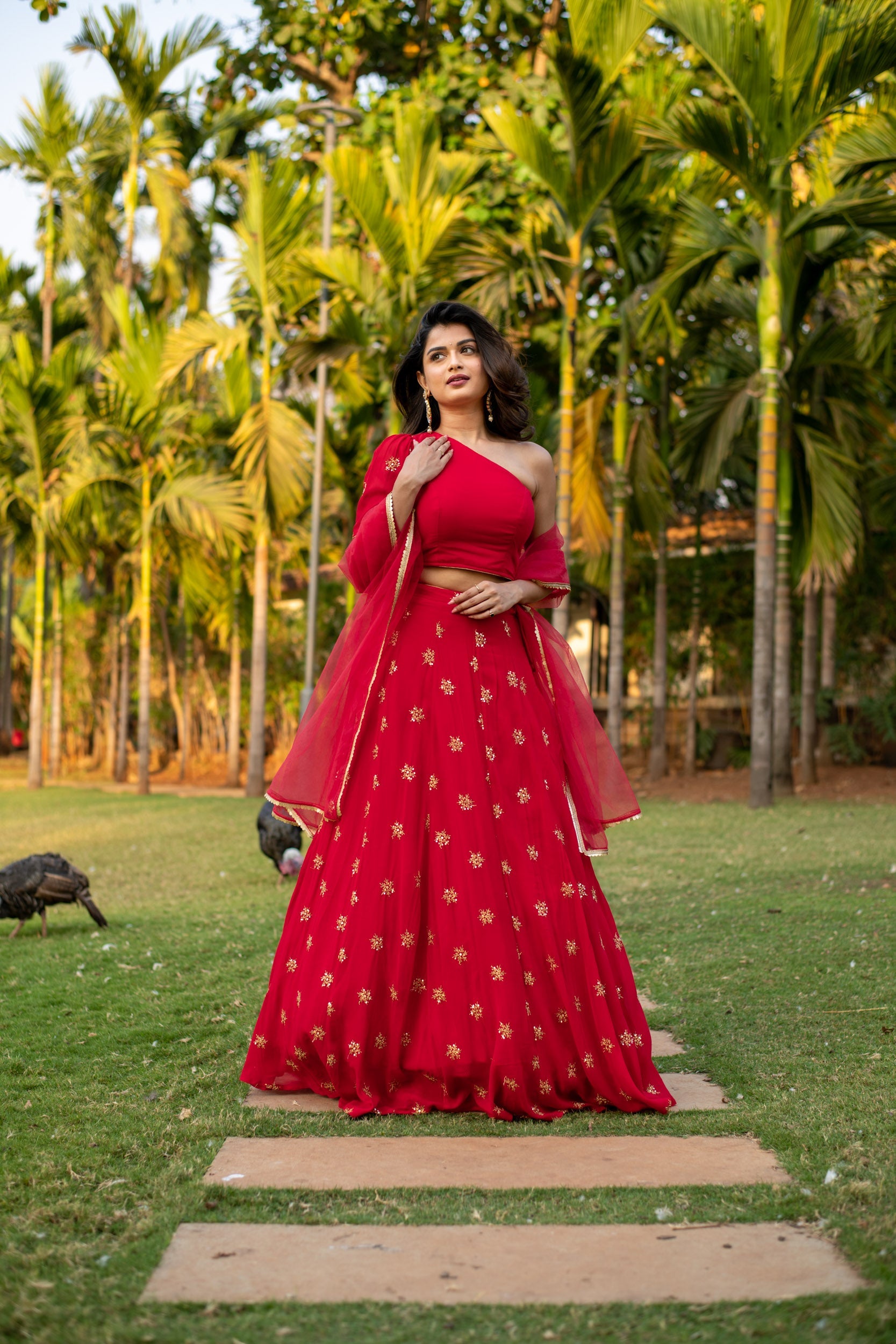 Red one shoulder Lehenga