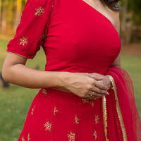 Red one shoulder Lehenga
